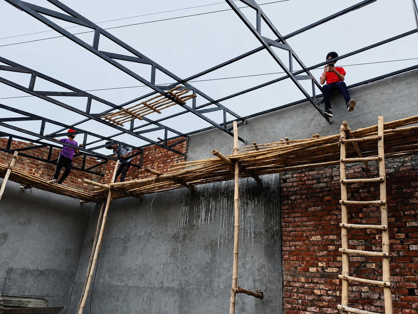 Raw structural steel truss preparation