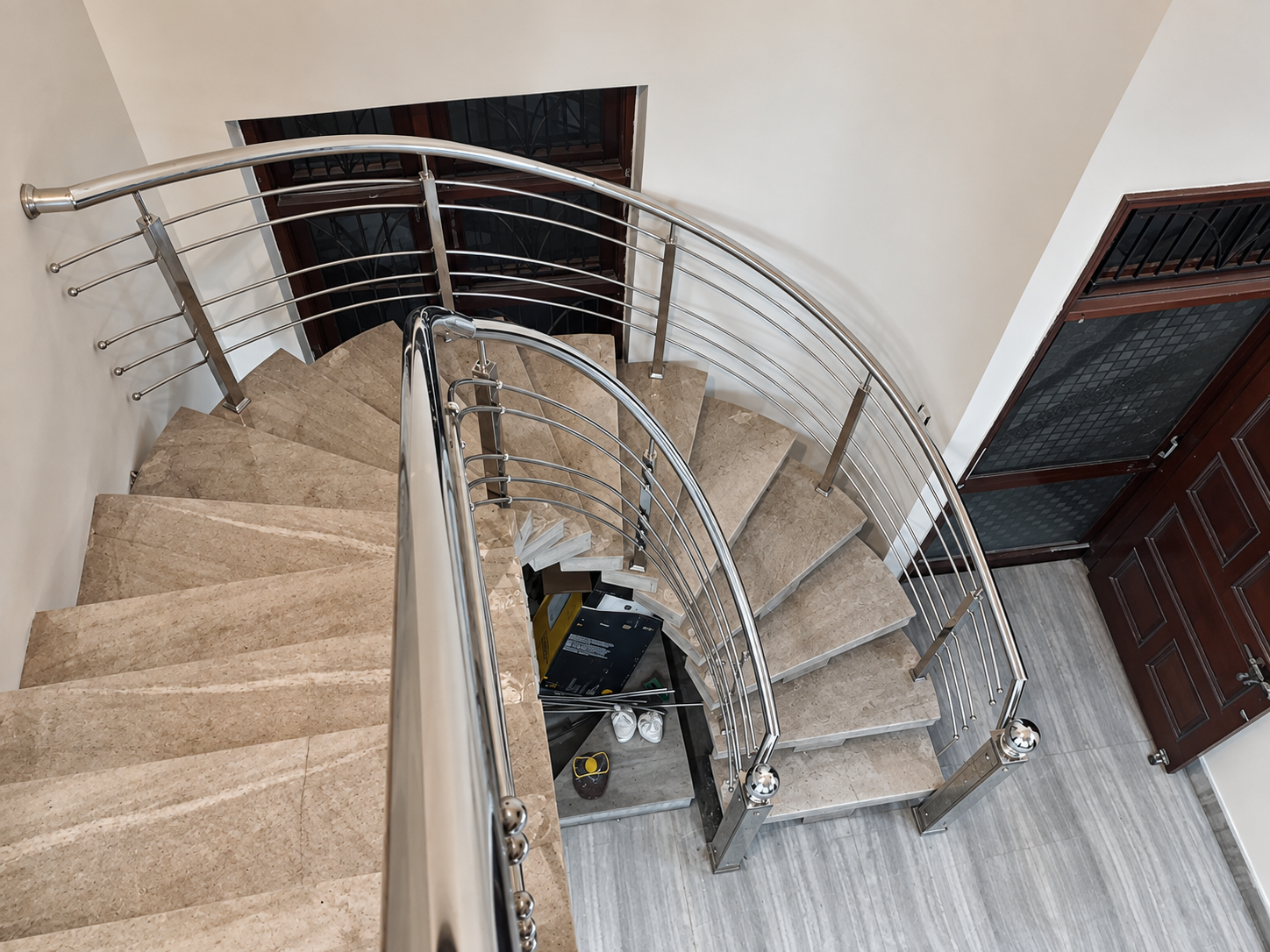 Curved helical spiral staircase Ludhiana by Lotey Metalcrafts