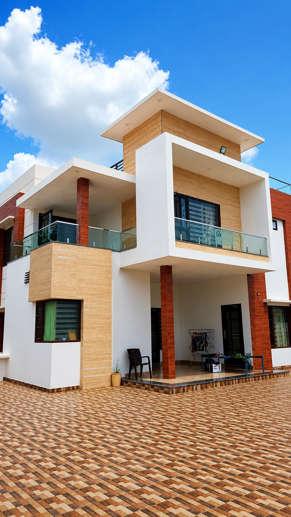 Luxury villa exterior glass railing installation by Lotey Metalcrafts