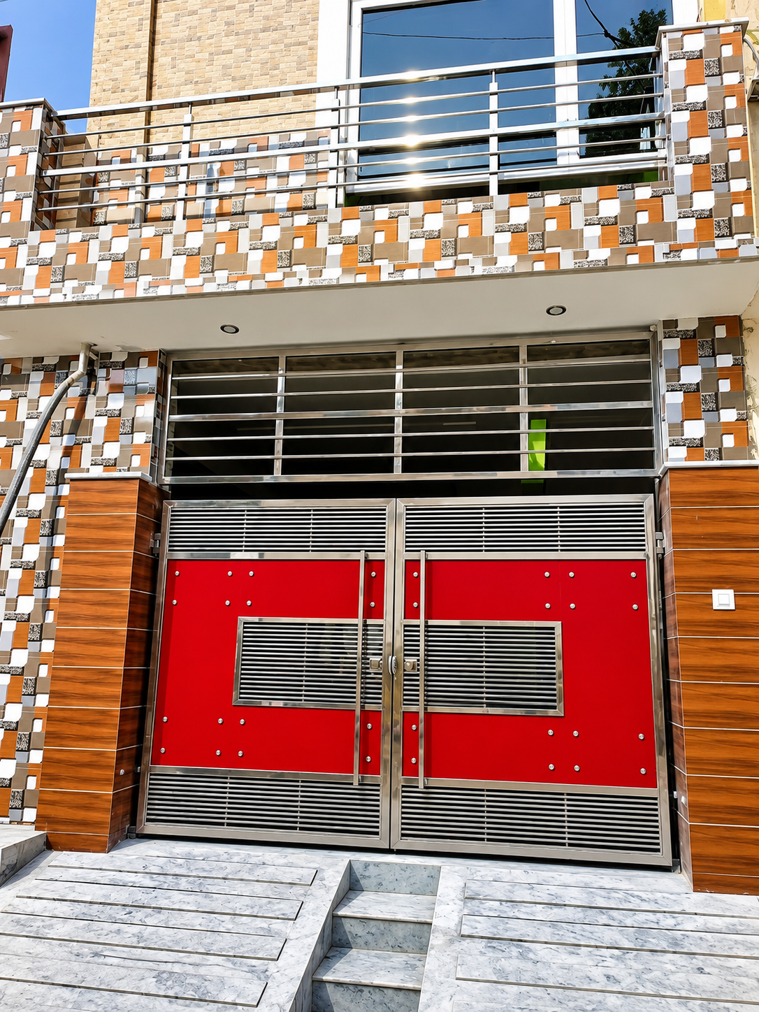 Stainless steel and red panel modern entry gate by Lotey Metalcrafts